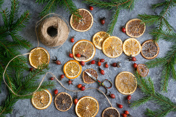 Dried oranges from which make a New Year's garland, 2023 festive background.