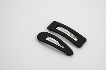 set of two black hair grips slides styles isolated on a white background - obrazy, fototapety, plakaty