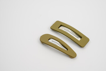 set of two olive hair grips slides styles isolated on a white background