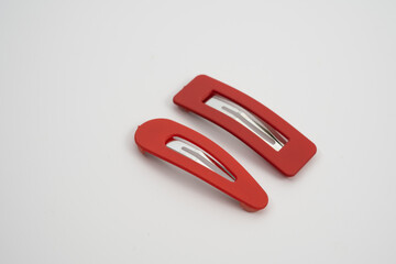 set of two red hair grips slides styles isolated on a white background - obrazy, fototapety, plakaty