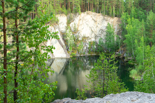 Talkov Kamen or Talkov Stone is flooded quarry that formed lake in Sysert district, Sverdlovsk region, Russia. Bazhovskie Places Natural Park. Abandoned talc mine