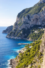 Rocky Coast by Sea at Touristic Town on Capri Island in Bay of Naples, Italy. Sunny Day.