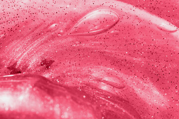 Red monochrome slime texture with glitter.Good for text overlay.