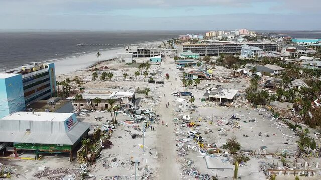 As day breaks on September 29, 2022, the damage from Hurricane Ian is seen for the first time on Fort Myers Beach, FL.