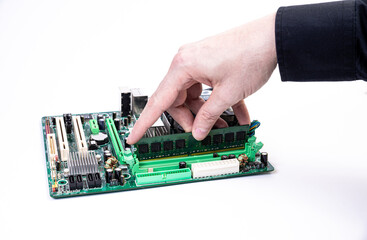 Installing a new RAM DDR memory for a personal computer processor socket in a service. Upgrade repair. PC upgrade or repair concept.
