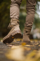 Leather waterproof boots on military. Demi-season high boots of khaki color