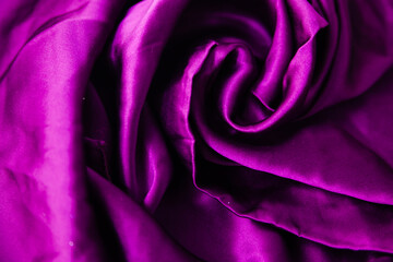 Drapery in purple fabric. Sewing material .texture for design