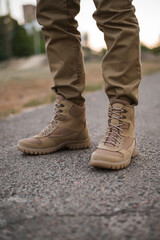 A soldier shod in special tactical khaki shoes