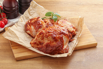 Marinated chicken leg in tomato sauce