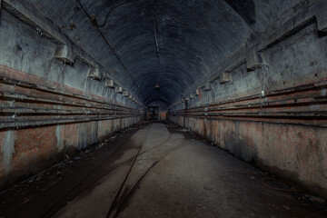 A view into a long tunnel of a World War II bunker. Maginot line in France.