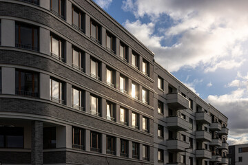 Fototapeta premium A modern facade, sun reflected in the windows, in Heidelberg
