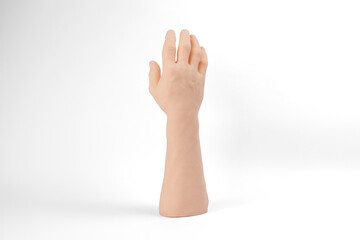 Arms for Medicine, tatto Silicone arm Fake arm Prototype Fake hand White skin Fake skin White background Plastic arm For training Close