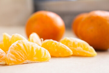 close-up of a tangerine segment with defocused background