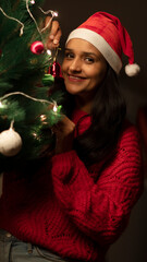 Young Indian woman celebrating Christmas