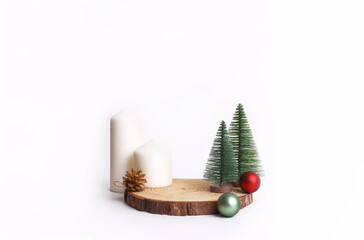 Fototapeta na wymiar Merry Christmas mock up setups on white background. Xmas tree, jingle bells, wooden slice disc.