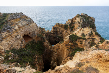 Dramatic view of a rugged Atlantic ocean coastline in Portugal Algarve Region