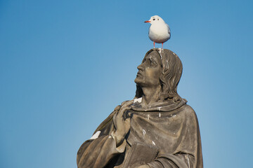 John the Evangelist on Charles bridge, Prague. Czech Republic.