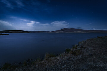 night landscape lake among the hills