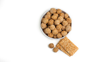 Indian sweet for traditional festival makar sankranti , Till ke  laddu made from Amaranth seed in Bowl on Brown background