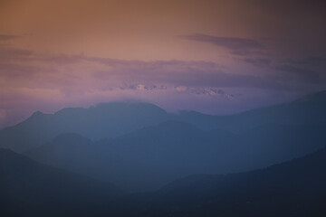 Obraz premium mountain ranges after sunset twilight