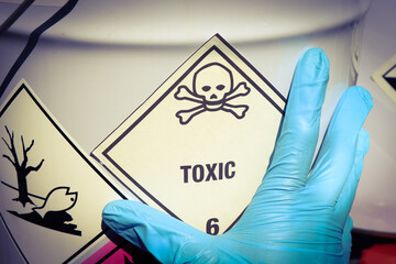 The toxic symbol on chemical products, dangerous chemicals in industry - obrazy, fototapety, plakaty