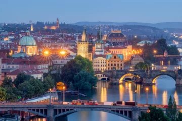 Keuken spatwand met foto Scenic spring blue hour view of the Old Town pier architecture and Charles Bridge over Vltava river in Prague, Czech Republic © Kyrenian