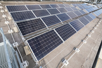 Rows of solar panels on the roof.