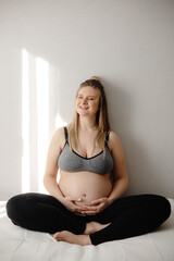 pregnant woman on bed