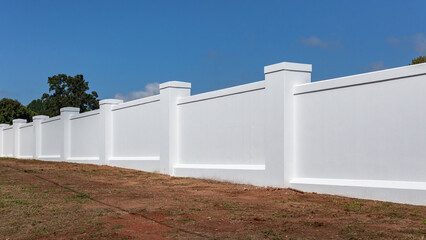 Property High Boundary Wall White Blue Sky Countryside Summer.