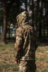 Ukrainian soldier in a warm fleece army jacket. Special insulating clothing for the military