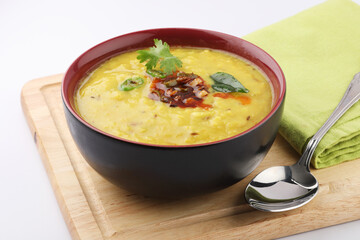 Indian popular food Dal Tadka Curry served with roti flatbread 