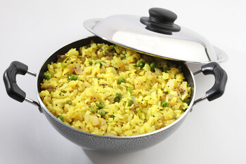 rice flakes, traditional indian breakfast called Pohe poha, onion pohe ,aval upma