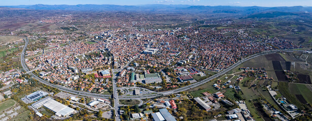 Aerial view of the city Kumanovo in North Macedonia on a sunny day in autumn.