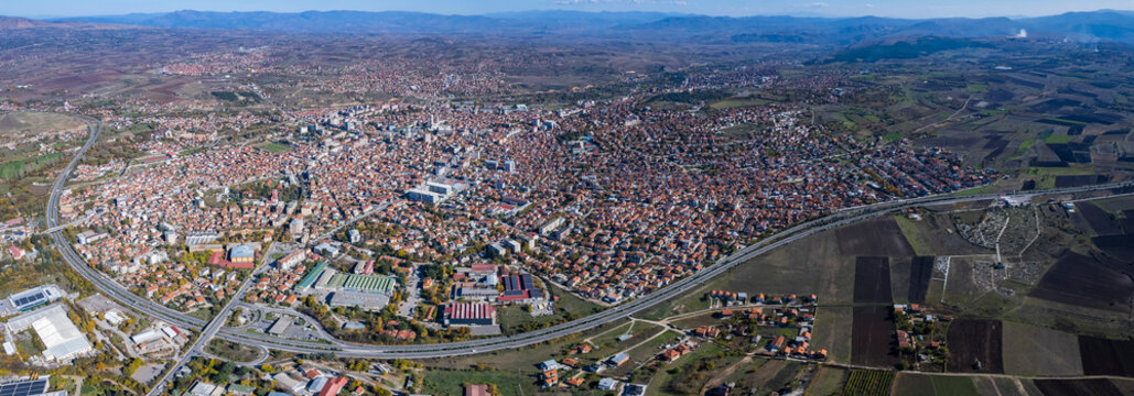 Aerial view around the city Kumanovo in North Macedonia on a sunny day.	