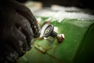 Turning on the gas generator in winter. Work in winter with an electric generator. The concept of a...