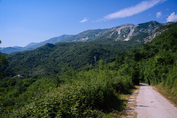 Fototapeta na wymiar Road in the mountains. Balkans. May month.