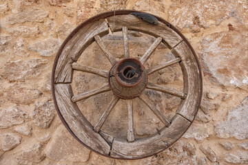 Old wooden wheel - antique horse carriage wheel -