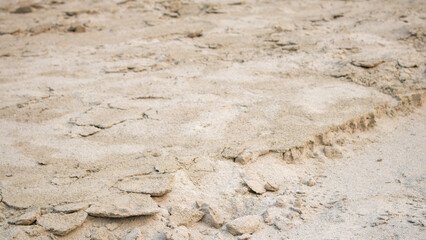 Texture made of send. The river has receded and covered the sand.