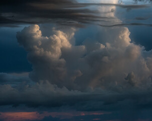 Layered stratus and cumulus clouds at sunset over the Gulf of Mexico, Longboat Key, Sarasota, Florida - obrazy, fototapety, plakaty