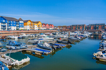 Fototapeta na wymiar Exmouth, Devon, England, UK - April 2022: Colorful houses in the Exmouth Marina