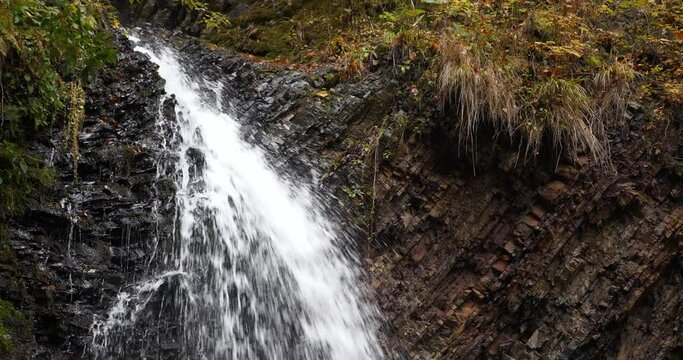 Zhenetskyi Huk or Huk waterfall, Zhenets river in Carpathian National Park, Gorgany mountain ridge, western Ukraine. Cinema 4K 60fps video with sound