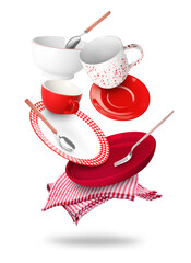 Flying stylish clean tableware, napkins and cutlery on white background