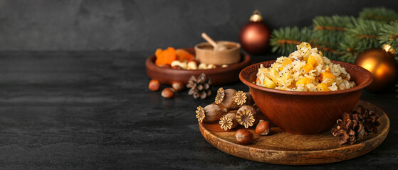 Bowl of traditional Ukrainian kutya dish on dark background with space for text