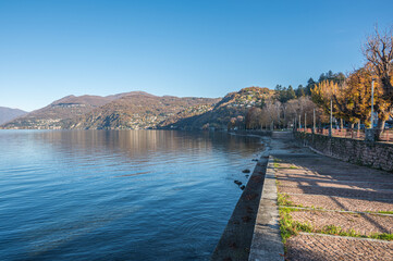 The promenade on the lake in Luino with the mountains in the background