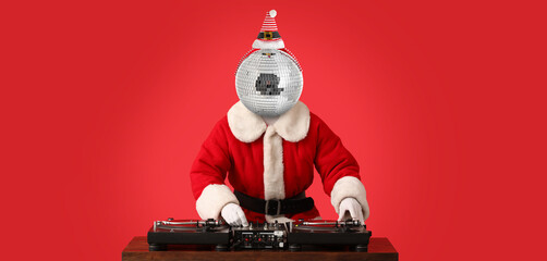 Santa DJ with disco ball instead of his head on red background