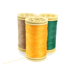 Sewing thread spools isolated on white background