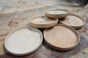 wood coasters on wooden table