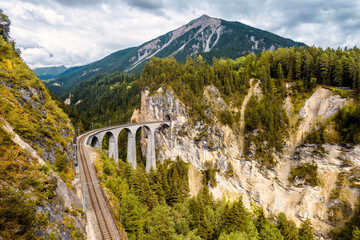 Landwasser Viaduct in Filisur, Switzerland. Aerial view of railway in mountain