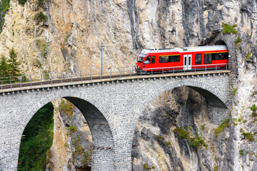 Bernina express glacier train on Landwasser Viaduct, Filisur, Switzerland