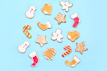 Set of different Christmas cookies on color background